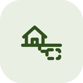 Small house on a lot with a septic tank drawn in dashed outline below grade beside it.